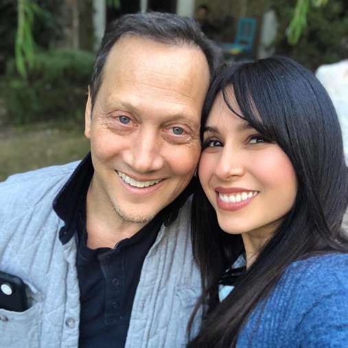 Rob Schneider with his wife Patricia Arce